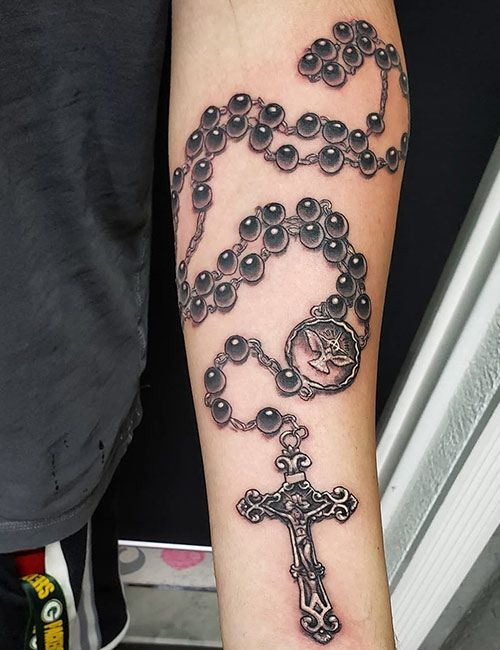 Religious symbol design for forearm tattoo