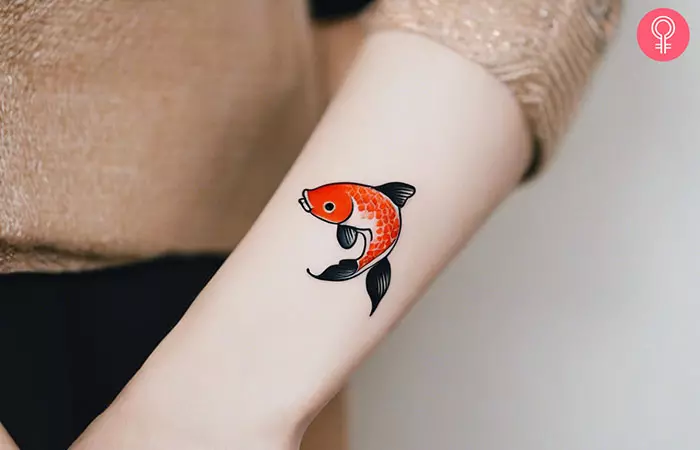 Simple Koi fish tattoo on the forearm