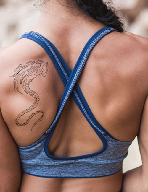 Siren tattoo on the back