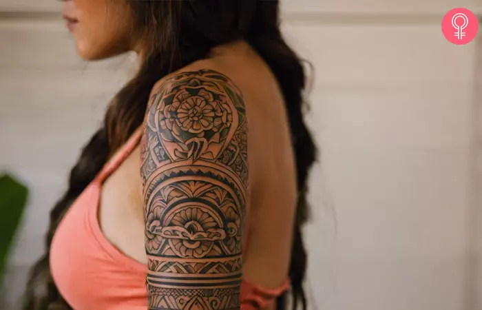 A traditional Hawaiian tattoo on a woman’s upper arm