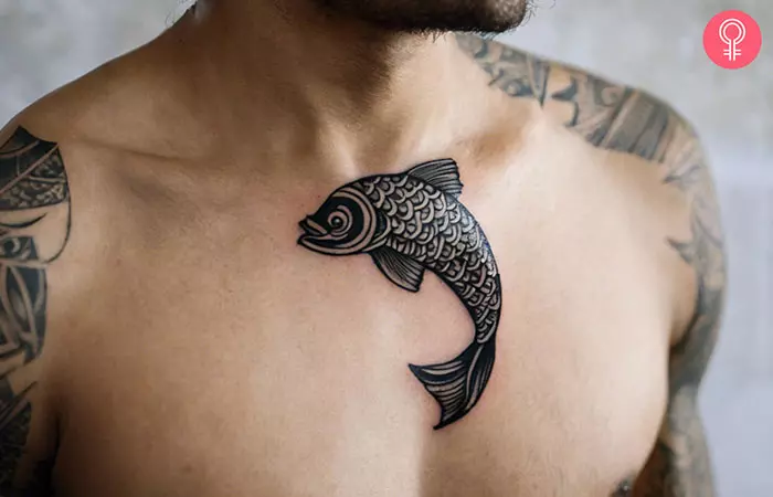 Tribal Koi fish tattoo on the front shoulder