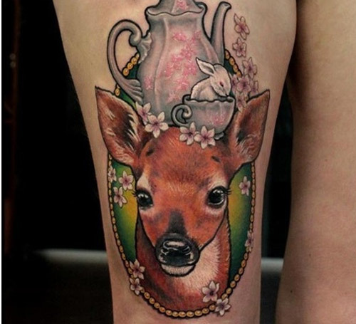 Feminine deer tattoo design