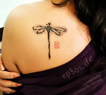 whimsical dragonfly tattoo