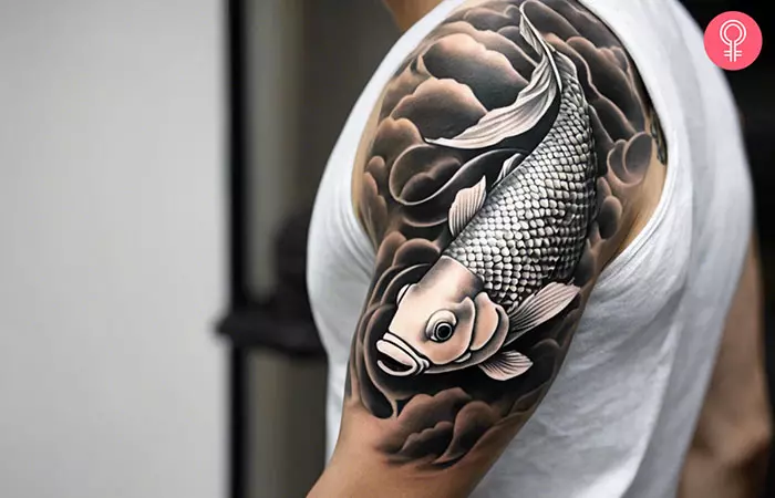 White Koi fish tattoo on the shoulder