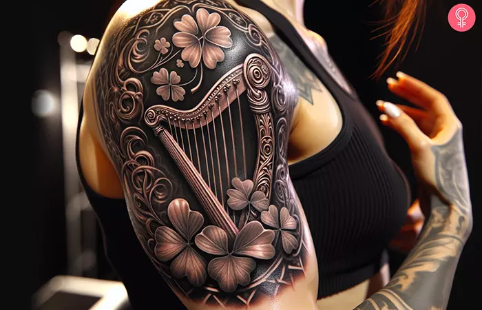 Woman-with-a-realistic-tattoo-of-shamrock-and-harp-on-her-upper-arm