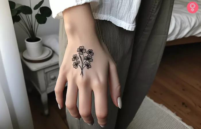 Woman-with-a-shamrock-tattoo-on-her-hand