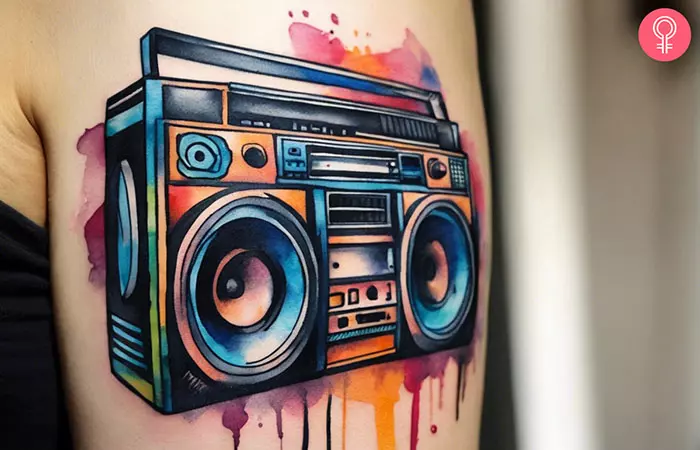 boombox tattoo on the arm