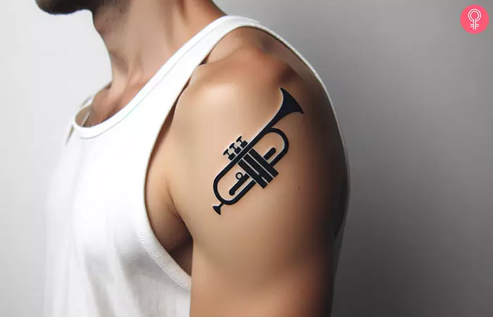 trumpet tattoo on the upper arm