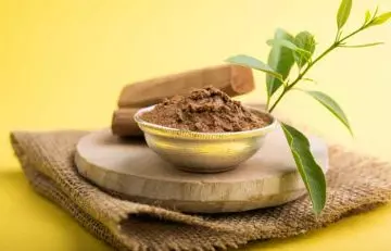 Ayurvedic treatment for glowing skin with sandalwood and almond powder to boost skin health