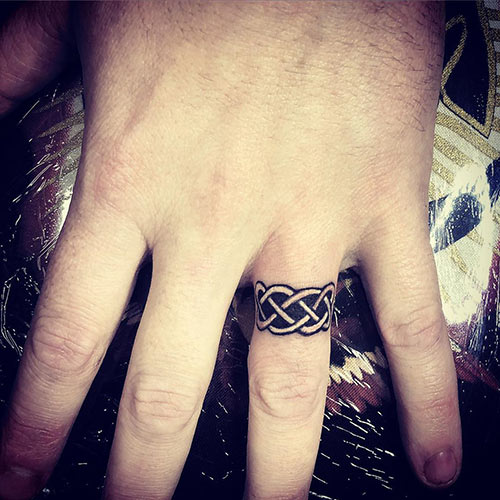 Celtic wedding ring tattoo