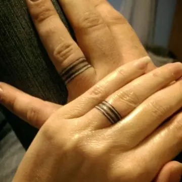 Simple wedding ring tattoos