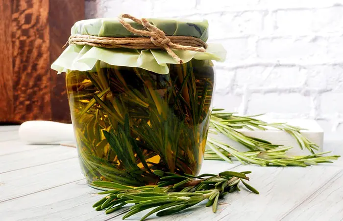 A jar of rosemary olive oil