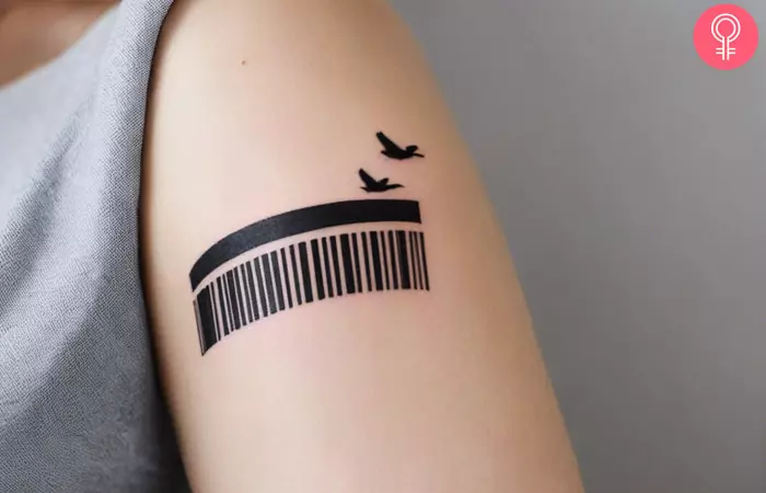 A barcode tattoo designed with birds