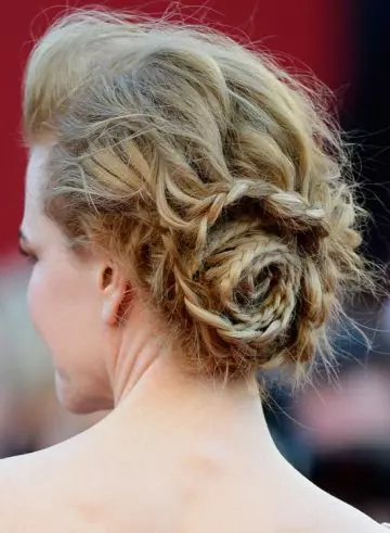 Braided low side spiral bun red carpet hairstyle