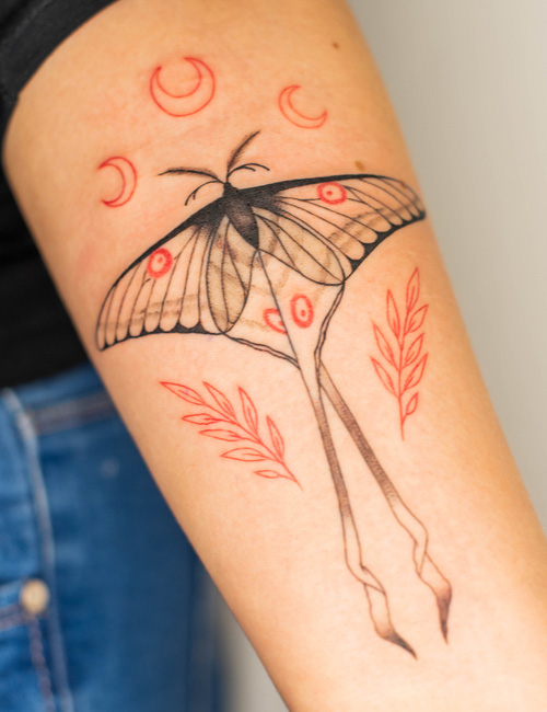 A classy butterfly tattoo design.