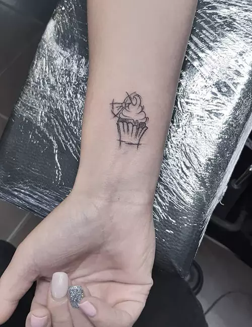 Cupcake finger tattoo design