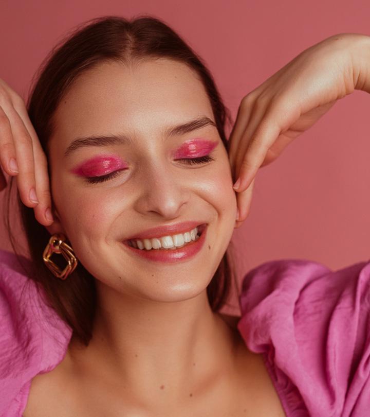 A woman with pink eye makeup