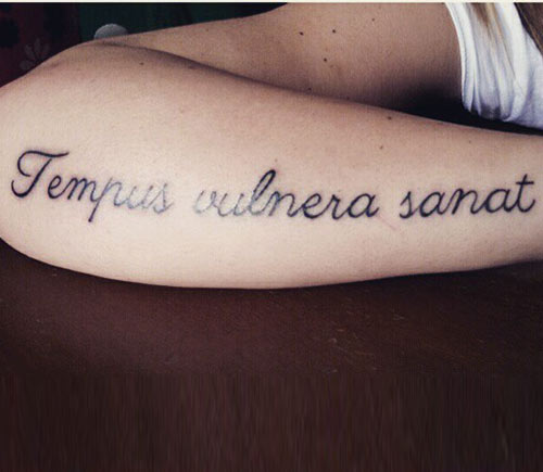 Latin quote tattoo design on sleeve