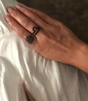 A miniature quirky tattoo design for libras to flaunt on their fingers