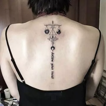 A set of symmetrically drawn libra scale tattoo design to flaunt on your back