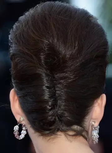 Mishmash of bouffant with French twist hairstyle for bride