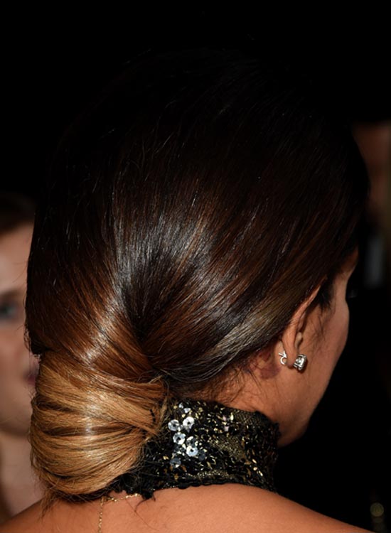 Mysterious low bun red carpet hairstyle