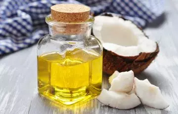 Onion juice and coconut oil for hair nourishment