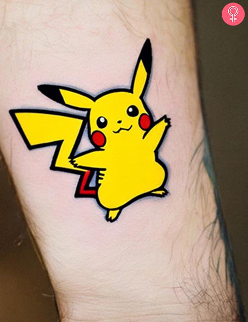 Simple Pikachu tattoo on the upper arm of a man
