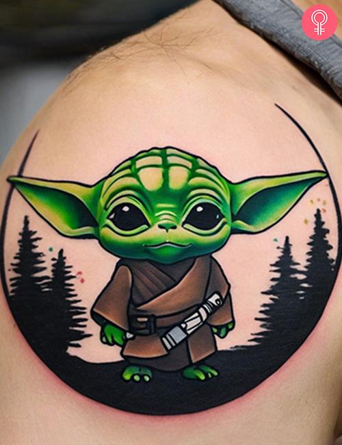 Simple Yoda tattoo on the shoulder of a man