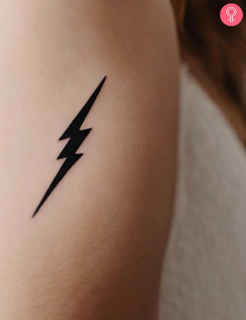 Simple flash tattoo on the upper of a woman