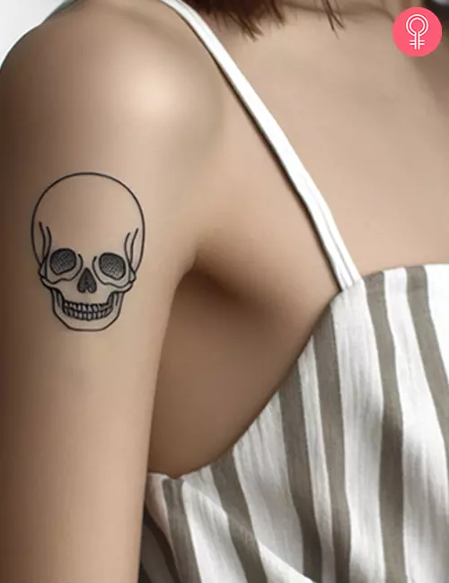 Simple skull tattoo on the forearm