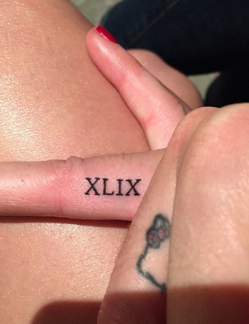 Super bowl number tattoo on Katy Perry's finger