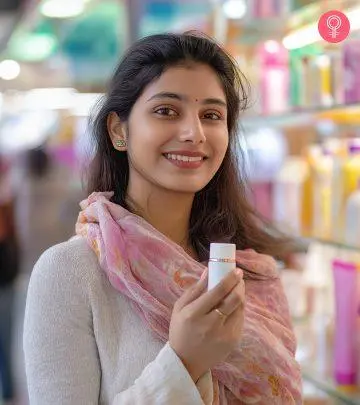 A woman with Indian cosmetics