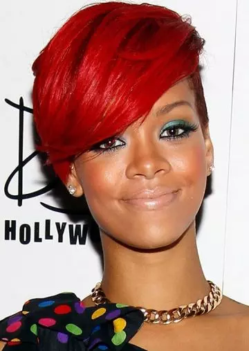 Very short fiery red bob with long side-swept bangs