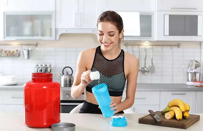 WOman drinking whey protein for weight loss