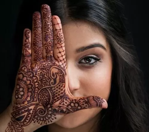 Dense mehndi design for engagement