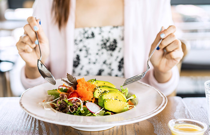 Woman eating a healthy meal