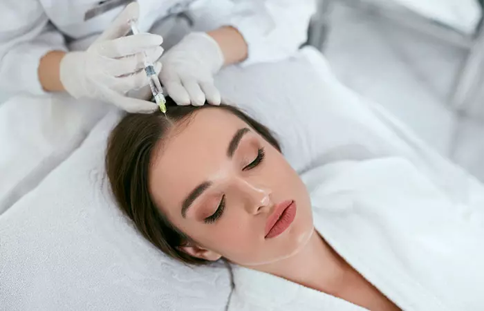 Woman receiving mesotherapy injection in a clinic