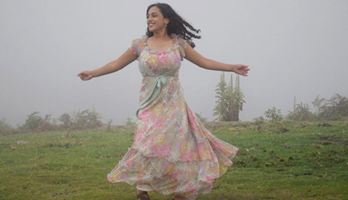 Nithya Menon without makeup in a full-length dress