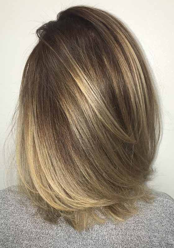 Ash-gold hair color with lowlights