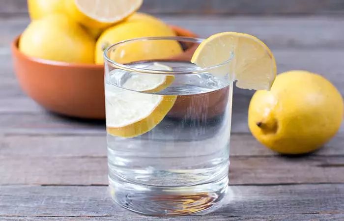 Warm lemon water to get rid of abdominal bloating