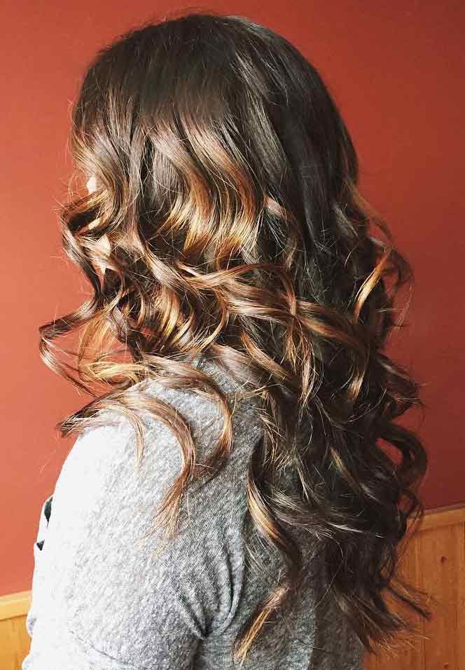 Dark brown hair with rich caramel babylights hair color