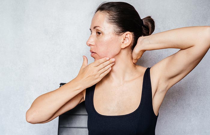 Woman doing neck rotation at day 1 of scarsdale diet
