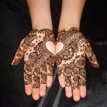 Heart henna design with floral pattern