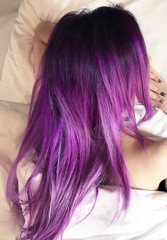 Electric plum balayage hair color