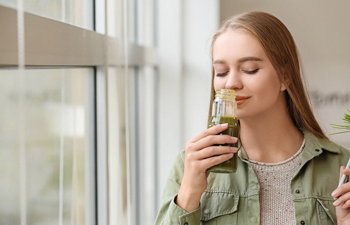 Woman enjoying a healthy drink for increased immunity and growing taller