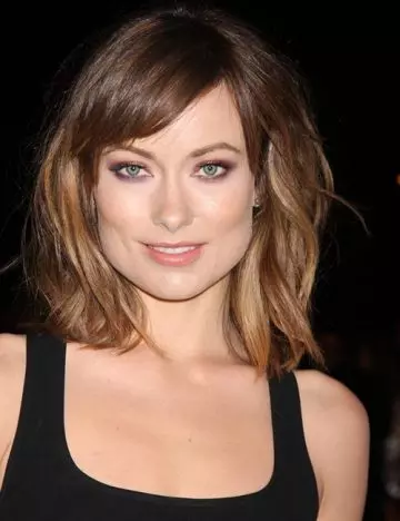 Short side-swept bangs with messy bob hairstyle