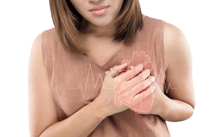 Close up of a woman experiencing heart problem.