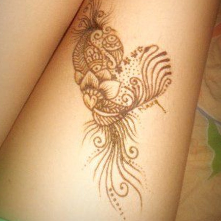 Heart henna design formed with different designs
