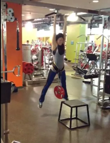 Weighted pull-up exercise for women